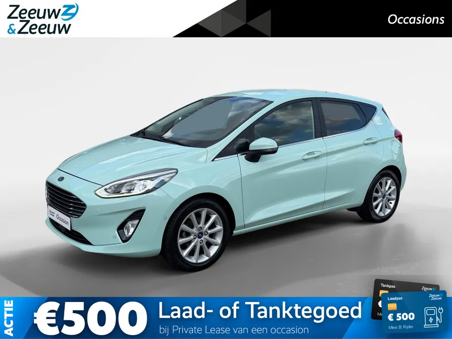 Ford Fiesta 1.0 EcoBoost Titanium | Dealer onderhouden | 1e eigenaar | Adapt. Cruise control | Parkeersensoren voor en achter | Achteruitrijcamera | Trekhaak | Navigatie | Apple carplay & Android auto | Voorruitverwarming | Privacy glas | Bovag garantie |