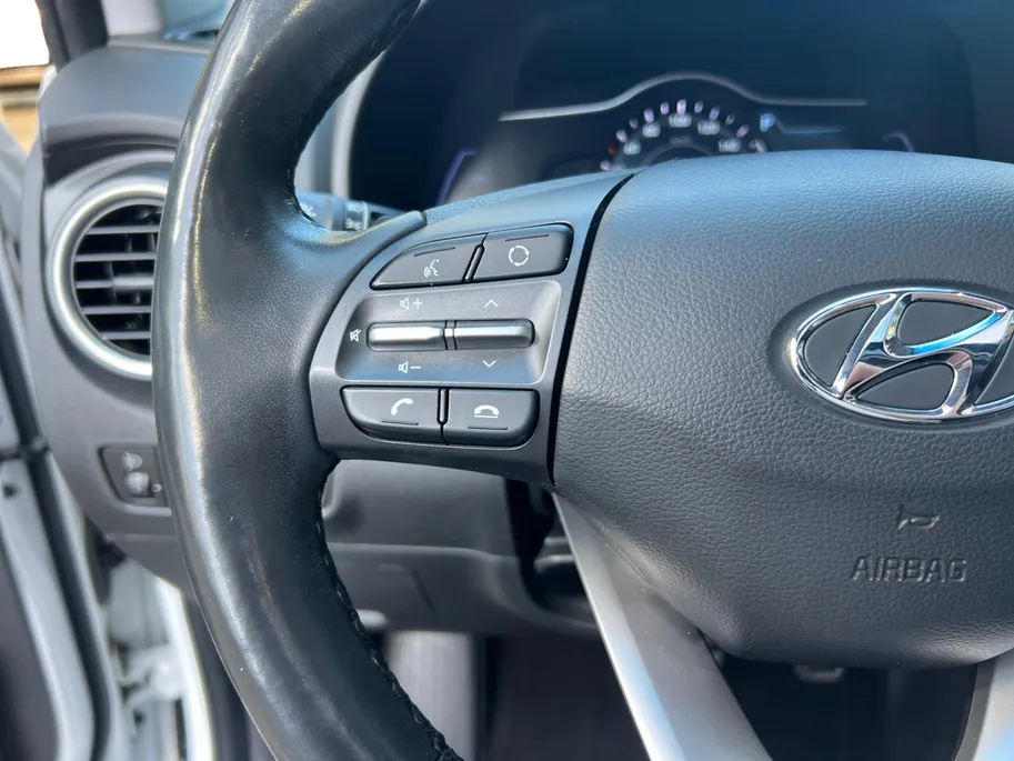Hyundai Kona EV Fashion 64 kWh 204PK | Warmtepomp | Navigatie | Apple Carplay & Android Auto | Adaptive cruise control | Open dak | Head-up display | Achteruitrijcamera |