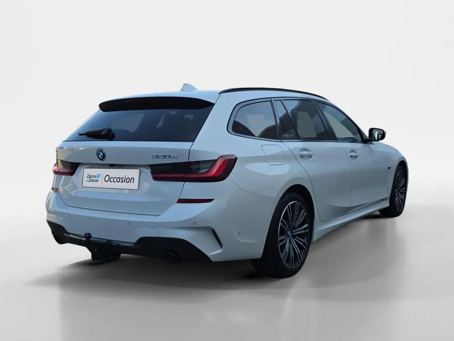 BMW 3 Serie Touring 320e Business Edition Plus | Dealer onderhouden! | 1e Eigenaar | Trekhaak | Achteruitrijcamera | Elektr. Achterklep | Lederen bekleding | Virtual cockpit | 12 maanden garantie