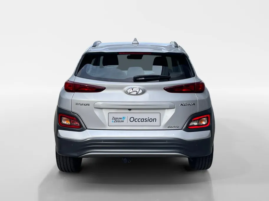 Hyundai Kona EV Comfort 64 kWh 204PK | Warmtepomp | 100% SOH | Adaptive cruise control | Apple Carplay & Android Auto | Achteruitrijcamera | Parkeersensoren achter | Keyless entry | DAB radio |