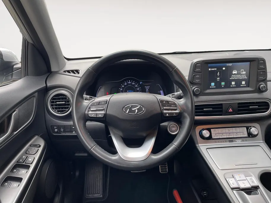 Hyundai Kona EV Comfort 64 kWh | Warmtepomp | 100% SOH | Adaptive cruise control | Apple Carplay & Android Auto | Achteruitrijcamera | Parkeersensoren achter | Keyless entry | DAB radio |