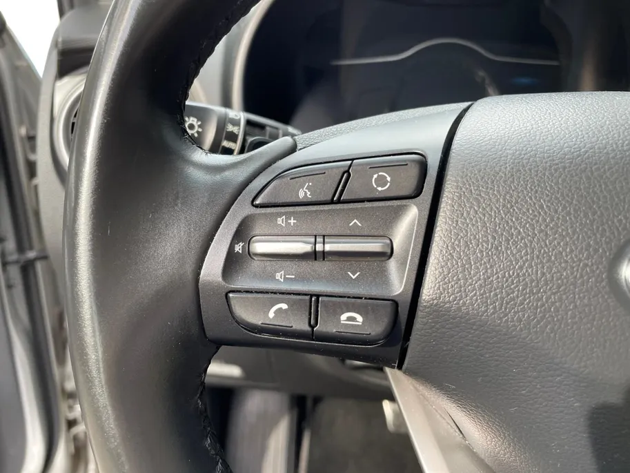 Hyundai Kona EV Comfort 64 kWh 204PK | Warmtepomp | 100% SOH | Adaptive cruise control | Apple Carplay & Android Auto | Achteruitrijcamera | Parkeersensoren achter | Keyless entry | DAB radio |