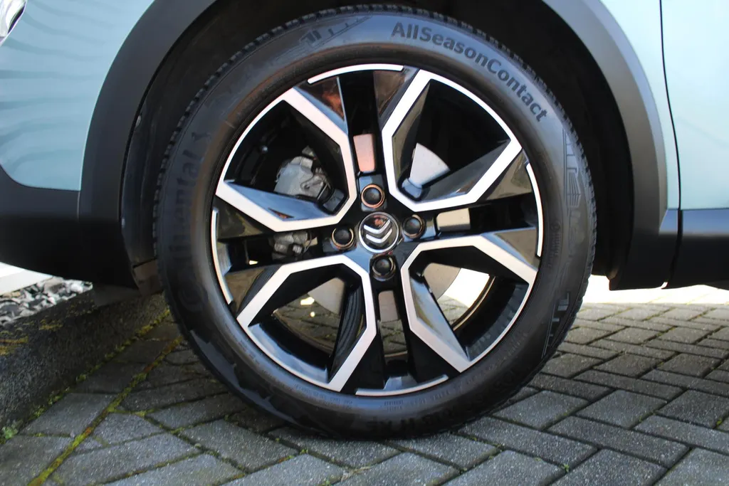 Citroën ë-C4 Shine 50 kWh | Airco | Cruise | Navi | Keyless | Trekhaak | LM Velgen | Heads Up Display | Stoelverwarming |