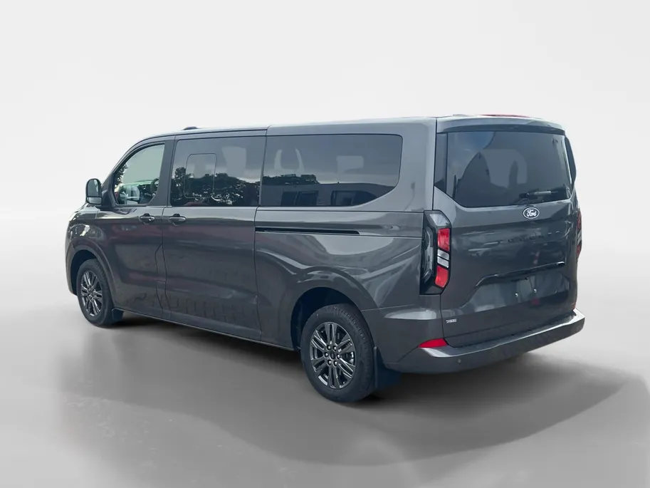 Ford Tourneo Custom 340 L2 Titanium 2.5 PHEV 233 pk | 9-persoons | TE BESTELLEN | Dual-zone airco | Inklapbare trekhaak | Cruise control | Verwarmd stuurwiel | Dubbele schuifdeuren met uitzetruiten | 17' LM velgen