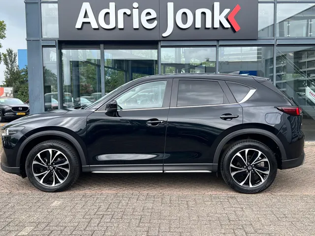 Mazda CX-5 2.0 e-SkyActiv-G M Hybrid 165 Newground AUTOMAAT | TREKHAAK | 360gr. CAMERA | NAVIGATIE | APPLE + ANDROID | HEAD-UP DISPLAY | 19'LM VELGEN | EL.A. KLEP |