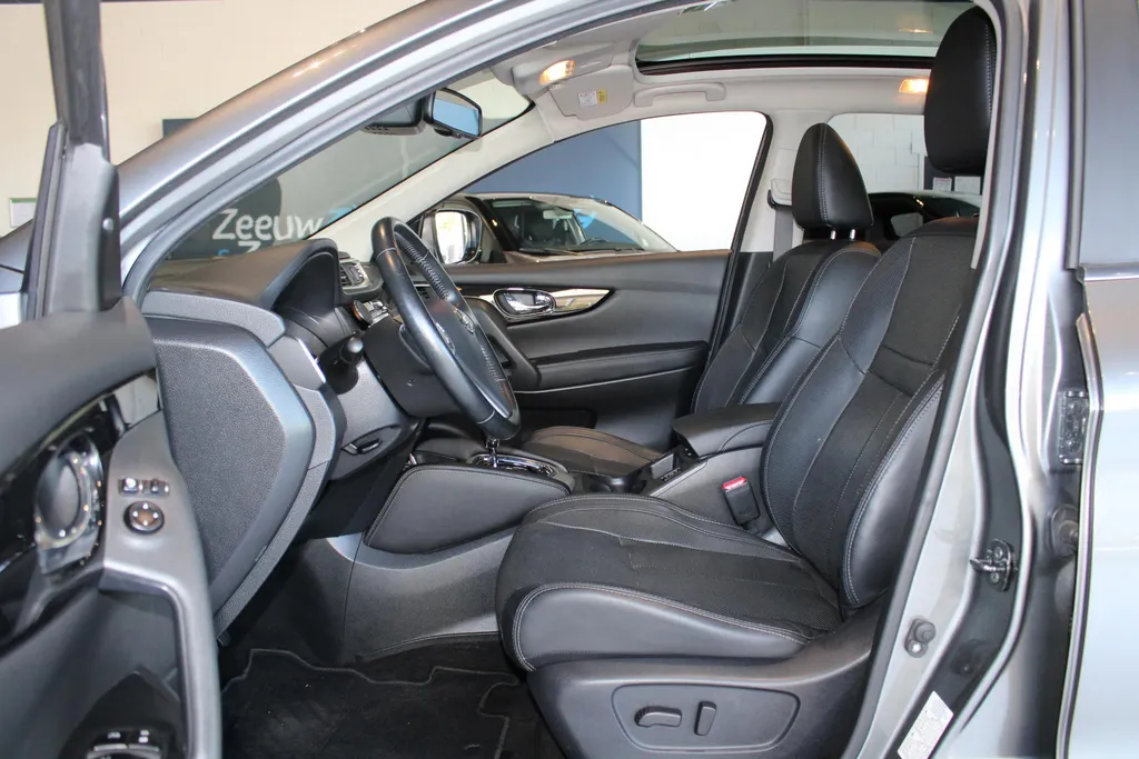 Nissan QASHQAI 1.2 Tekna | Automaat | Lederen bekleding | Electrische Stoel verstelling | 360grd camera | Parkeersensoren voor en achter | Dodehoek sensoren | Nette auto met weinig kilometers | Stoel verwarming |