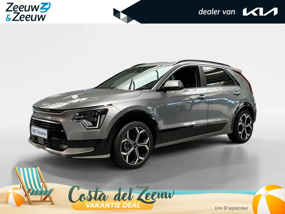 Kia Niro 1.6 GDi PHEV DynamicPlusLine Edition | Orginele Kilometerstand! | Apple Carplay / Android Auto | Navigatiesysteem | Elektrisch Verstelbare Bestuurdersstoel | Stoel + Stuurverwarming | Licht + Regensensor | Parkeersensoren Voor + Achter | Camera Achter | 1