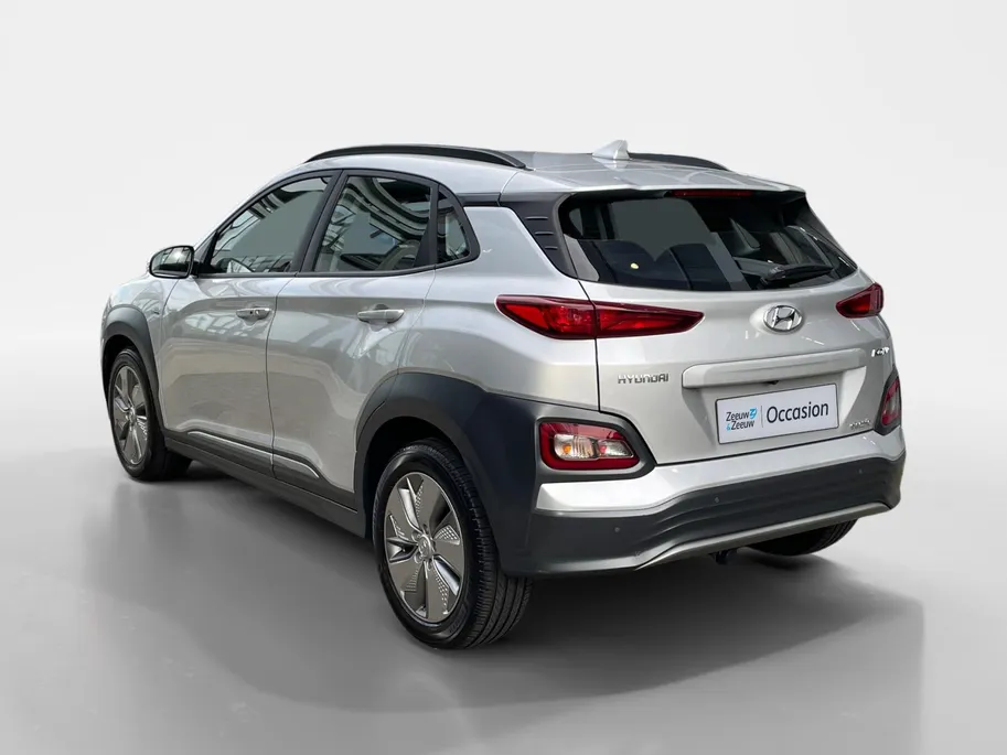 Hyundai Kona EV Comfort 64 kWh 204PK | Warmtepomp | 100% SOH | Adaptive cruise control | Apple Carplay & Android Auto | Achteruitrijcamera | Parkeersensoren achter | Keyless entry | DAB radio |