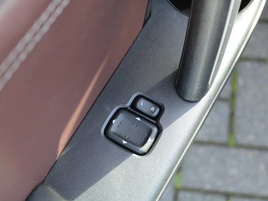 Mazda MX-5 Roadster Coupé 1.8 Hanabi | Stoelverwarming | Leer | Navi | 17" LM | Cruise | Clima | Hardtop | Nieuwstaat | Ned. auto |