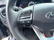 Hyundai Kona EV Fashion 64 kWh | Zeer nette auto | 100 % SOH | Stoelverwarming | Navigatie | Apple CarPlay & Android Auto | Achteruitrijcamera | Dealer onderhouden |
