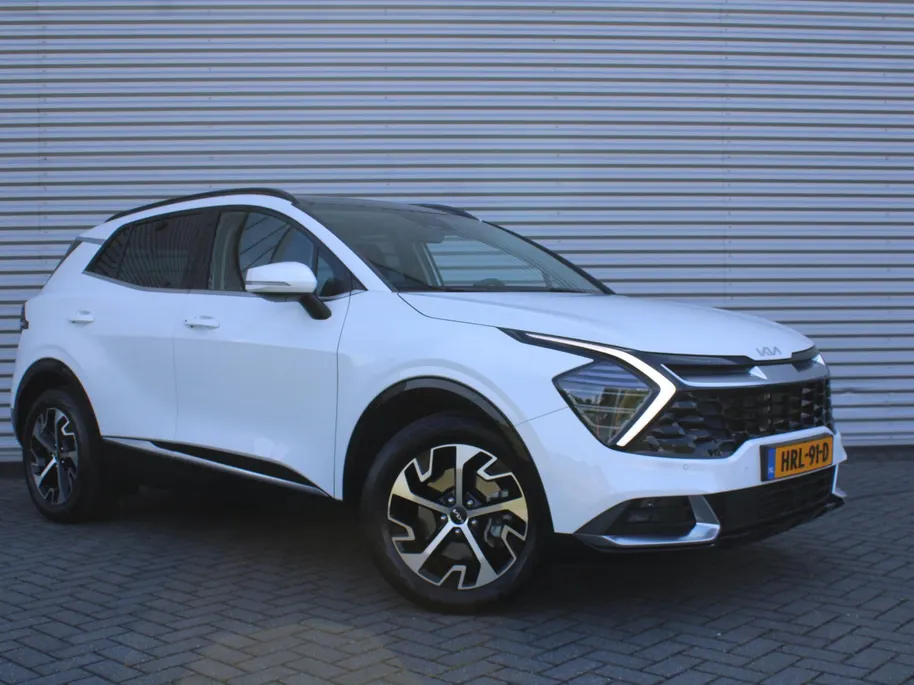 Kia Sportage 1.6 T-GDi Hybrid DynamicPlusLine | Stuur-/stoelverwarming | Elek. stoelverstelling + achterklep | Schuifdak | 18' LM | Matrix LED | Cruise adapt. | Camera |
