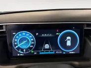 Hyundai Tucson 1.6 T-GDI PHEV Premium Sky 4WD | 66km WLTP elektrisch | Navigatie | Adaptive cruise control | Trekhaak | Apple Carplay & Android Auto | Dode hoek detectie | Draadloze telefoonlader |