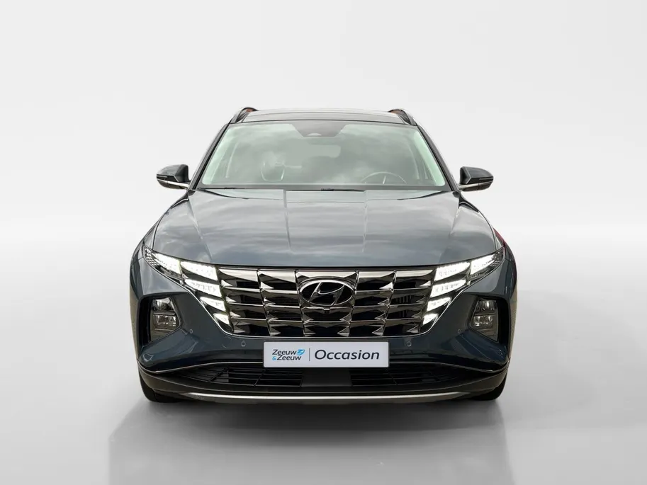 Hyundai Tucson 1.6 T-GDI HEV Premium Sky + Winterbanden! | 1650kg trekgewicht | Navi | 360 Camera | Stoel+ stuurverwarming | Elek. stoelverstelling