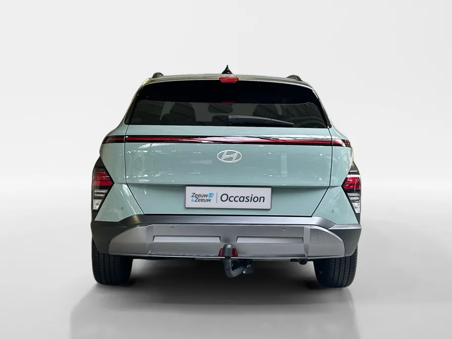 Hyundai Kona 1.6 GDI HEV Premium | Trekhaak Afn 13polig| Apple Carplay / Android Auto | Navigatiesysteem | Elektrisch Verstelbare Voorstoelen | Bestuurdersstoel + Geheugen | Parkeersensoren Voor + Achter | Camera Voor + Achter | Stoelverwarming + Stoelkoeling | Stuurv