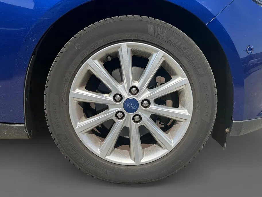 Ford Focus Wagon 1.0 Titanium 125 pk | Airco | Navigatie | LM Velgen | Dealer onderhouden!
