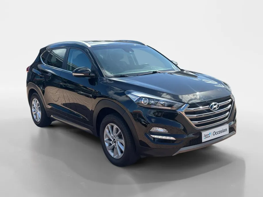 Hyundai Tucson 1.6 GDi Comfort *Navi+Camera*Climate Control*Trekhaak*Stoelverwarming*LM.Velgen*1ste eigenaar!