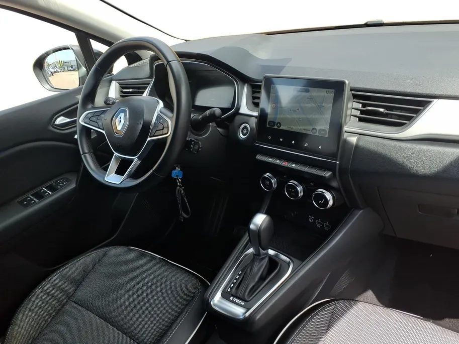 Renault Captur 1.6 E-Tech Hybrid 145 Intens Apple Carplay/Android Auto , electronic climate controle , camera , parkeersensor , lm velgen , navi , cruise , tel , usb.