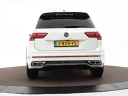 Volkswagen Tiguan 1.5 TSI 150pk DSG R-Line Business+ · Leder · Panoramadak · Apple/Android Car Play · Dodehoeksensor · Elek. Achterklep · 360 Camera · All-season banden · 19'' Inch · EXTRA INRUILKORTING ·