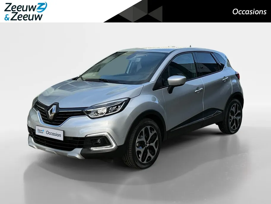 Renault Captur 1.3 TCe Intens | Winterset + Zomerset | Trekhaak | Automaat | Camera | Keyless | LED | Dodehoek | Bluetooth | Navi | Lichtmetalen Velgen | 1 Jaar Bovag Garantie |