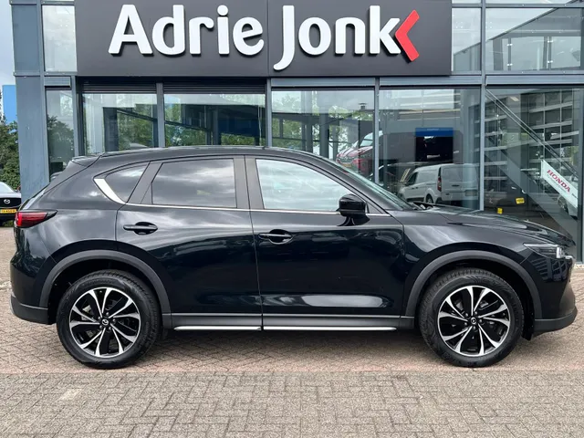 Mazda CX-5 2.0 e-SkyActiv-G M Hybrid 165 Newground AUTOMAAT | TREKHAAK | 360gr. CAMERA | NAVIGATIE | APPLE + ANDROID | HEAD-UP DISPLAY | 19'LM VELGEN | EL.A. KLEP |