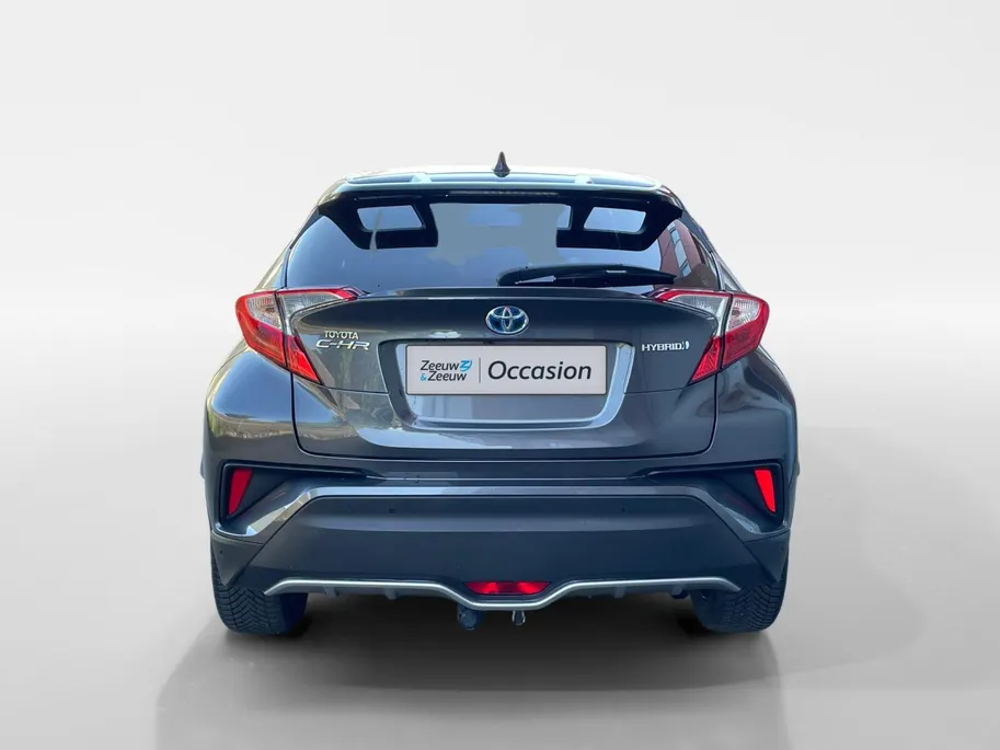 Toyota C-HR 1.8 Hybrid Bi-Tone | Side Bars| Leer| Lichtmetalen velgen| Stoel verwarming| 4 seizoenbanden| Afneembare trekhaak| JBL speakers| BI-Tone uitvoering| Navigatie| Metalliclak