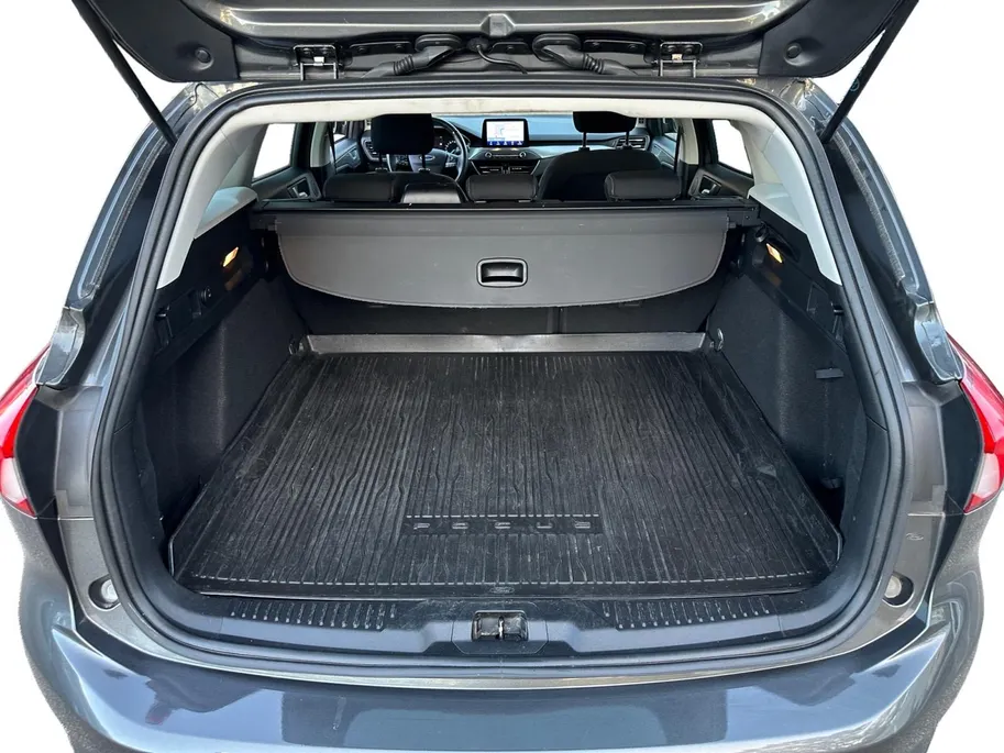 Ford Focus Wagon 1.0 EcoBoost Titanium Business | B&O | Adaptieve Cruise Control | Winter Pack | Privacy Glass | Navigatie | All weather banden