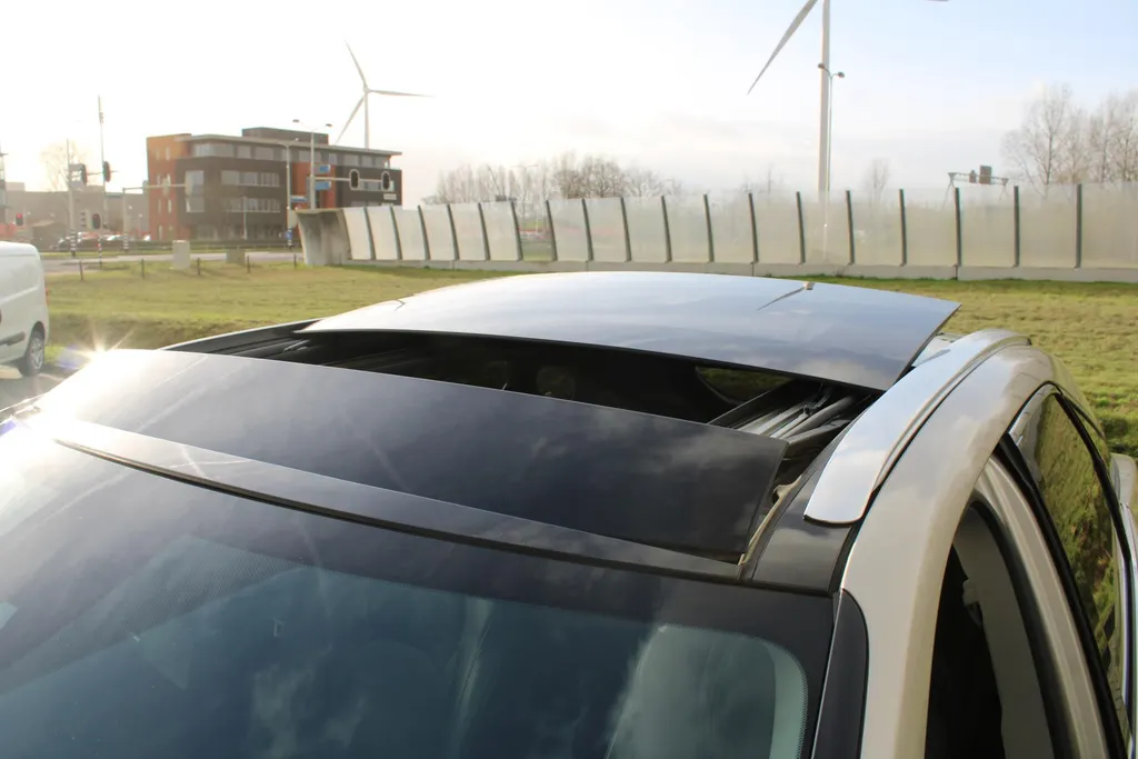 Lexus RX 450h 4WD Luxury Line | 20' LM | Navi | Camera | Leer | Schuif/kantel dak | Cruise adapt. | PDC | Stoelverwarming/ventilatie | HUD | Elek. stoelverstelling |