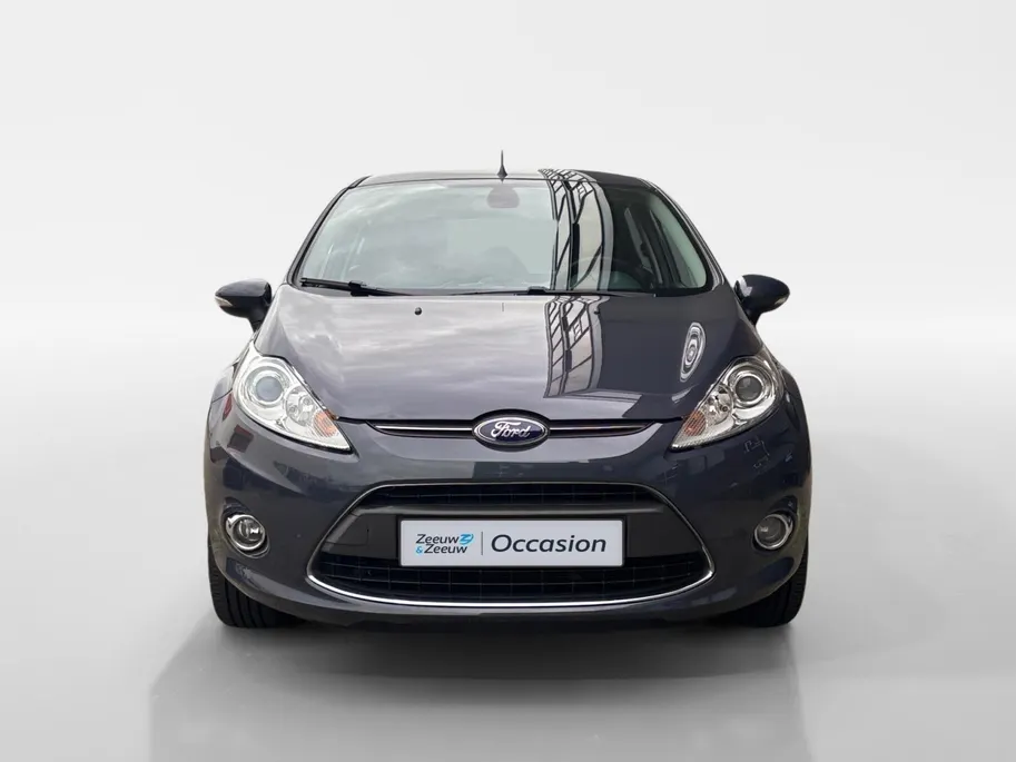 Ford Fiesta 1.4 Titanium | Voorruitverwarming | PDC | Airco | 12 maanden BOVAG garantie