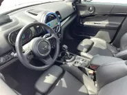 MINI Countryman 1.5 Cooper S E ALL4 Chili *Automaat*Navi+Camera*Climate Control*Schuif/kanteldak*Heads up Display*Harman Kardon Audio*Stoelverwarming*Vol opties!