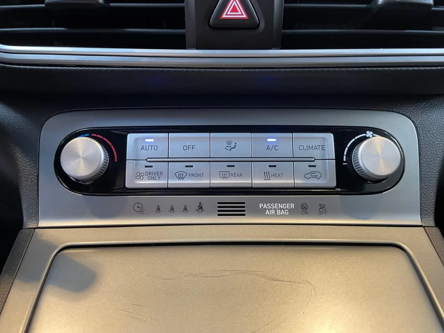 Hyundai Kona EV Fashion 64 kWh 204PK | Warmtepomp | Navigatie | Apple Carplay & Android Auto | 100% SOH | Adaptive cruise control | Climate control | Head-up display | Parkeersensoren achter |