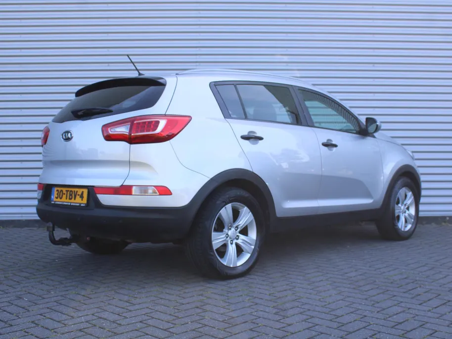 Kia Sportage 2.0 X-ecutive Plus Pack | Trekhaak | 17' LM | Parkeersensor achter | Half leer/stof | Navi Pioneer incl. Apple CarPlay/Android Auto | Cruise | Clima | Automaat |