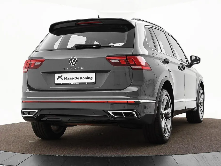 Volkswagen Tiguan 1.4 TSI 245pk DSG eHybrid R-Line Business · Apple/Android Car Play · Wegklapbare Trekhaak · Alarm · Dodehoek Detectie · Stoel-& Stuurverwarming · 19'' Inch ·