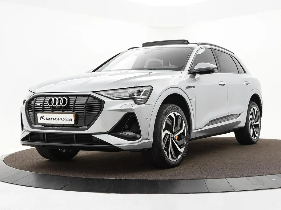 Audi e-tron 55 300kW/408PK S Line 95Kwh · SOH 94,6% · Panoramadak · Leder/Alcantara · 360°Camera + Parkeersensoren · Stoelverwarming ·