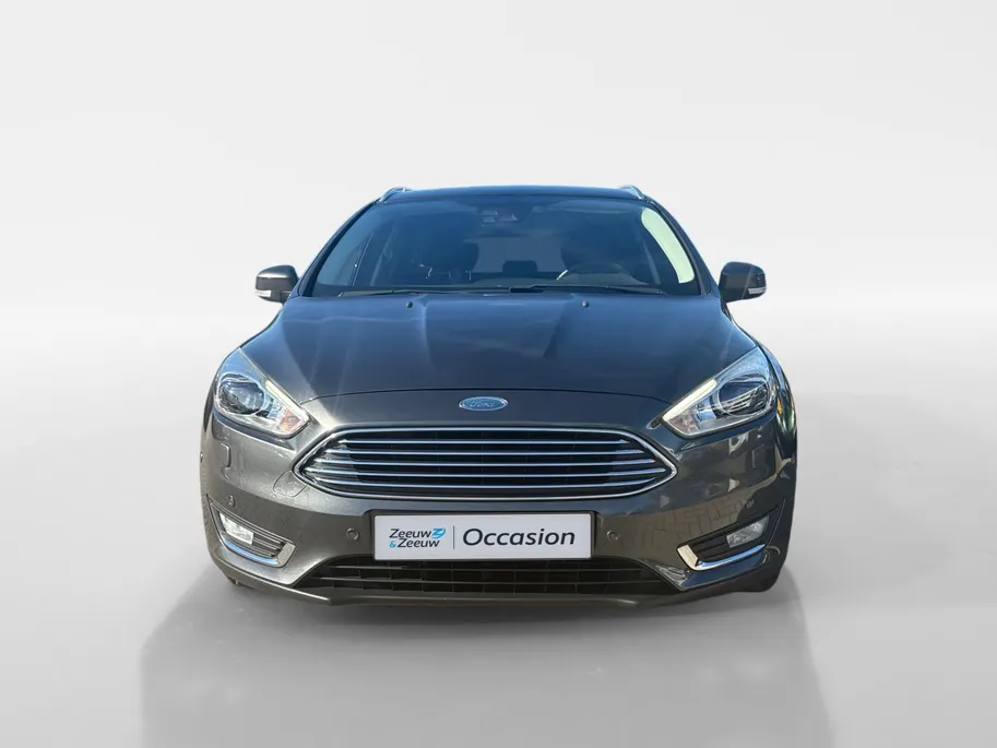 Ford Focus Wagon 1.0 Titanium |Lederen/stof bekleding| Trekhaak| bi-xenon koplampen| keyless entry| 12 maanden Bovag garantie|
