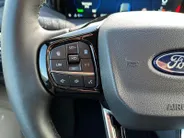 Ford Transit Custom 320 2.5 PHEV L2H1 Black Platinum DC EXCL. BTW &  | 233 pk Automaat | Lederen bekleding | Navigatie | Treeplanken | LM velgen 17' zwart | 360 graden camera | Dubbele schuifdeur