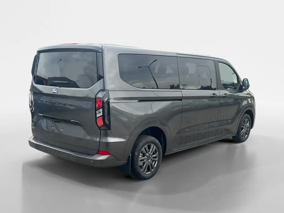 Ford Tourneo Custom 340 L2 Titanium 2.5 PHEV 233 pk | 9-persoons | TE BESTELLEN | Dual-zone airco | Inklapbare trekhaak | Cruise control | Verwarmd stuurwiel | Dubbele schuifdeuren met uitzetruiten | 17' LM velgen