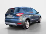Ford Kuga 1.5 EcoBoost Titanium nette dealer auto | Wegklapbare trekhaak| Navigatie| elec achterklep| Parkeersensoren| 4 seizoen banden| Stuur verwarming| Stoel verwarming| Vooruit verwarming| Climate Control |