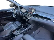 BMW X1 sDrive18i High Executive | Automaat | Head-Up Display | Automatische Achterklep | Panorama Dak | Stoelverwarming | Volledig Lederen Bekleding | Dealer Onderhouden | Camera | 12 Maanden BOVAG Garantie