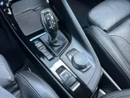 BMW X1 sDrive18i High Executive | Automaat | Head-Up Display | Automatische Achterklep | Panorama Dak | Stoelverwarming | Volledig Lederen Bekleding | Dealer Onderhouden | Camera | 12 Maanden BOVAG Garantie