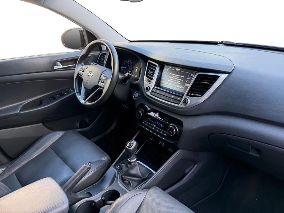 Hyundai Tucson 1.6 GDi Comfort | Elektrisch Verstelbare Stoelen | Navigatie | Bluetooth | Camera | Stoelverwarming | Cruise & Climate Control | Onderhoudshistorie | All Season Banden | 12 Maanden BOVAG Garantie