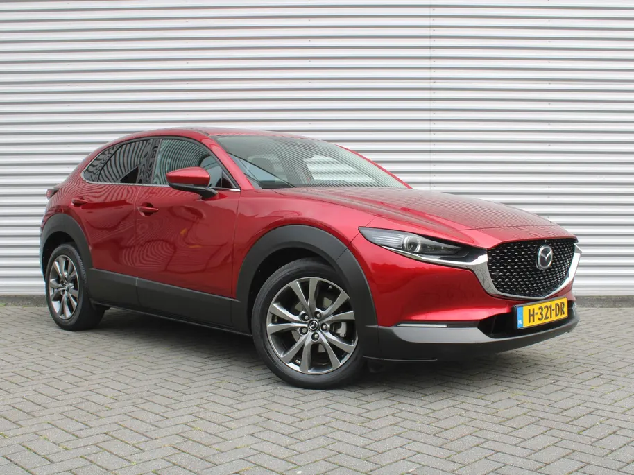 Mazda CX-30 2.0 e-SkyActiv-X M Hybrid Luxury | Trekhaak | Schuifdak | 18' LM | Leer | Elektr. stoelverstelling | Stuur-/stoelverwarming | HUD | 360 Camera | Winterset |