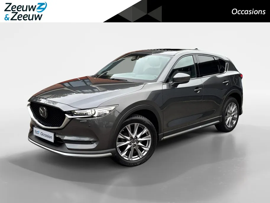 Mazda CX-5 2.0 SkyActiv-G 165 Signature | Schuif/kanteldak | 360 graden camera | Wegklapbare Trekhaak | Adaptieve Cruise Control | Navigatie | BOSE | Leder | 19' Lichtmetalen velgen