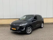 Ford Kuga 2.5 PHEV 225 pk Titanium Winter Pack - Draadloos opladen telefoon Origineel NL auto met weinig km.