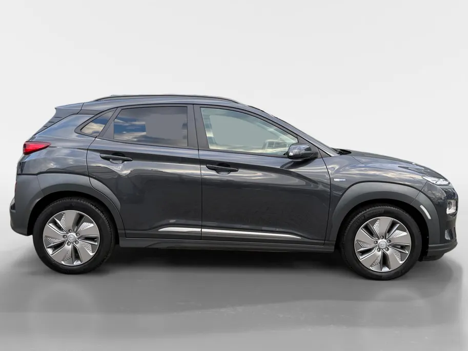 Hyundai Kona EV Fashion 64 kWh | Zeer nette auto | 97,6 % SOH | Navigatie | Head-up display | Achteruitrijcamera | Hoge zit |