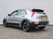 Kia Niro EV Light Edition 64.8 kWh | Airco | Cruise | Navi | Camera | PDC | 17' LM | All season banden | 17% bijtelling |
