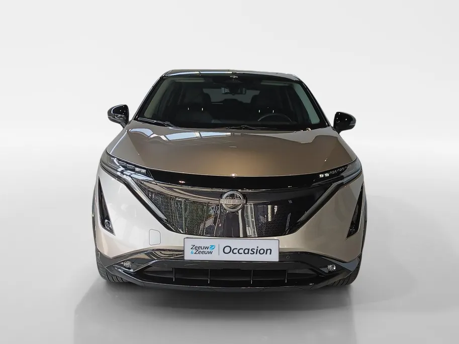 Nissan ARIYA Evolve 66 kWh | 22KW Lader| Afneembare trekhaak| Apple carplpay& Android auto| 360grd Camera| Stoelverwarming en verkoeling| Elektrisch verstelbare stoelen| Luxe bekleding| Dealer onderhouden|