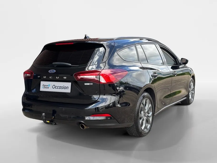 Ford Focus Wagon 1.0 EcoBoost Hybrid Titanium | Trekhaak | Stoel, stuur en voorruitverwarming | Cruise | Climate