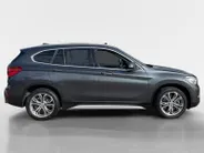 BMW X1 sDrive20i High Executive *Automaat*Navi*Camera*Schuif/kanteldak*Climate Control*Stoelverwarming*Lederen bekleding*LM. Velgen*Zeer nette auto!