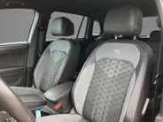 Volkswagen Tiguan 1.4TSIeHybrid 180kW/245PK R-Line Black Style · Panoramadak · Trekhaak · 360°Camera + Parkeersensoren ·
