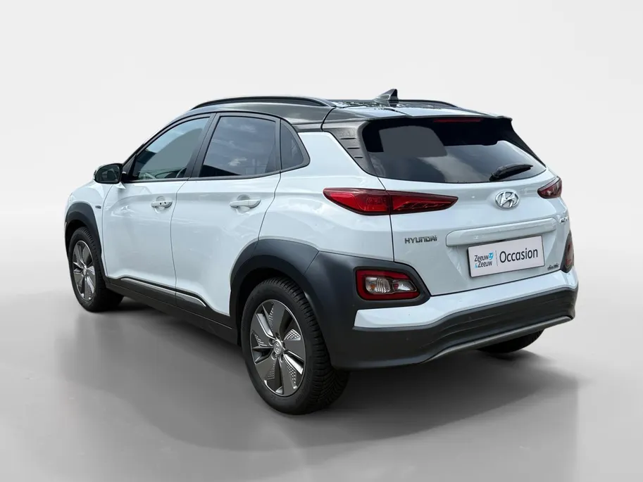 Hyundai Kona EV Premium 64 kWh | Achteruitrijcamera | Head Up Display | Dodehoek Detectie | Lederen Bekleding | Climate Control |